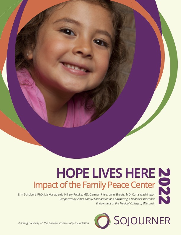 The cover of the Sojourner Family Peace Center 2022 Annual Report, featuring a smiling young girl, framed by intertwined purple, orange, and green rings against a beige background. The cover reads "Hope Lives Here 2022, Imapct of the Family Peace center" and the Sojourner logo.
